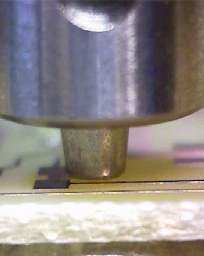 Through-hole plating Bungard Favorit - rivet being pressed